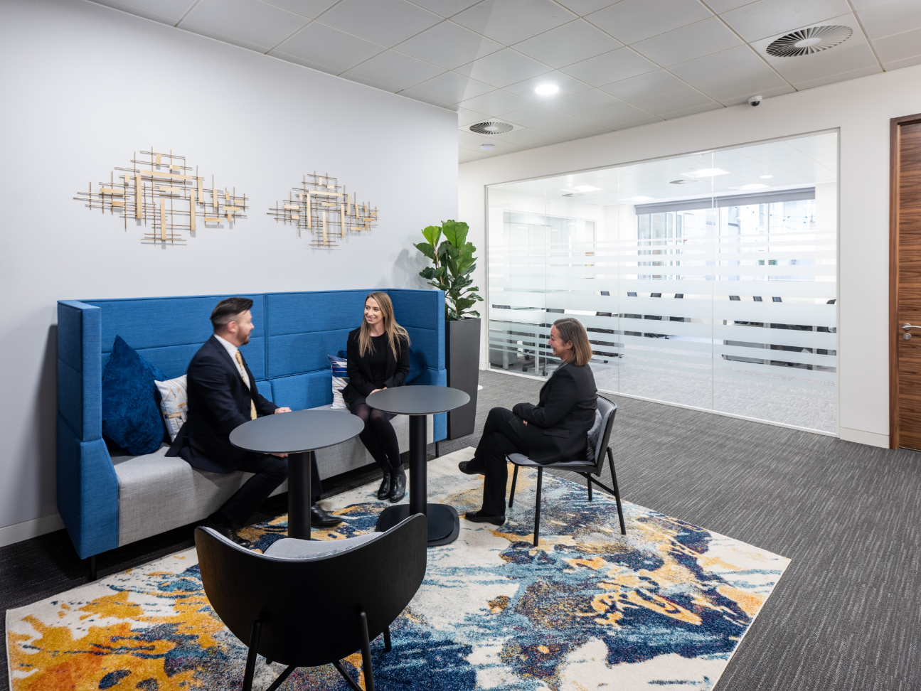 Orega Serviced Offices Glasgow St Vincent Street breakout space (with people)