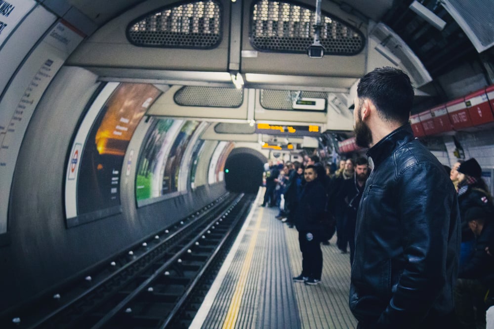 man waiting for train