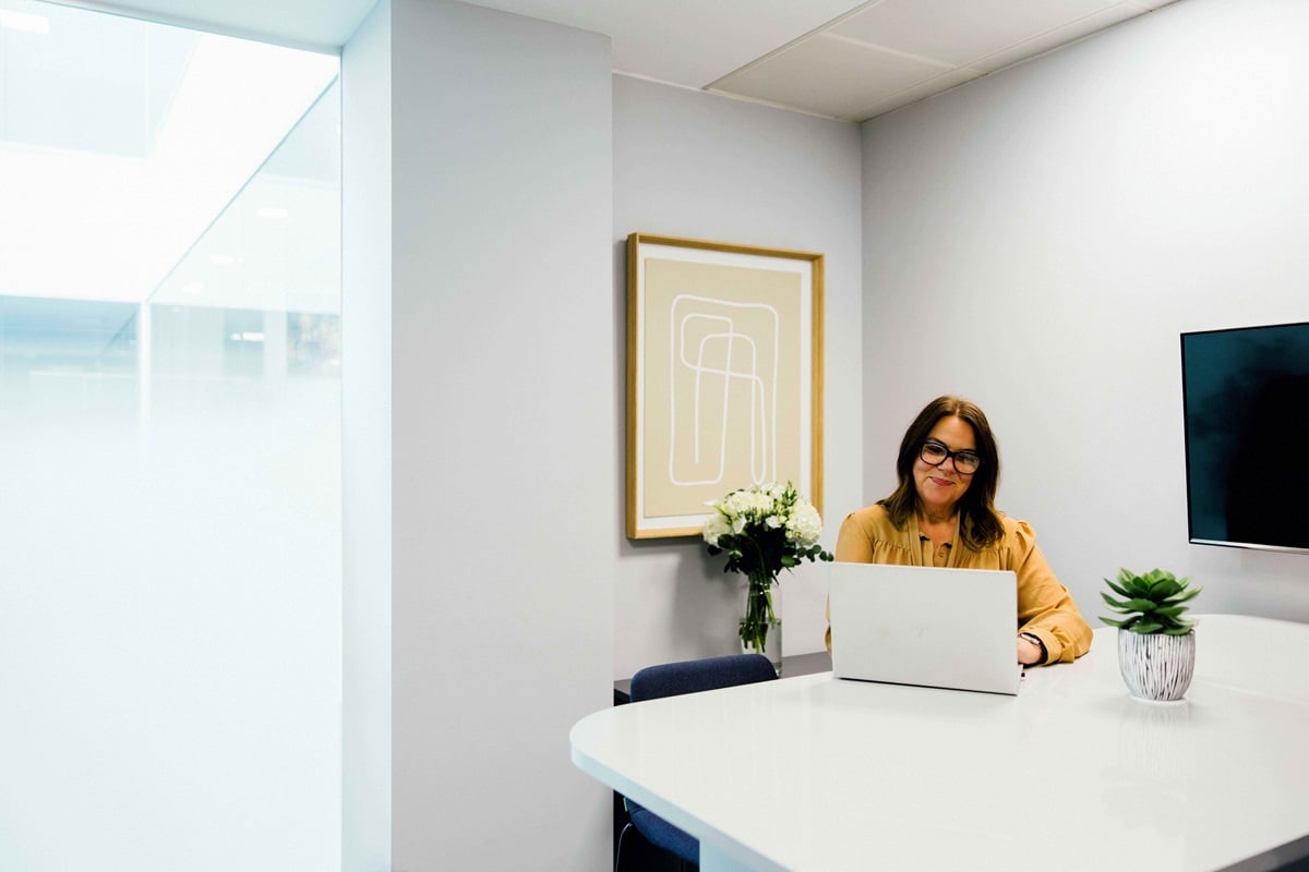 OregaUxbridge_HurricaneMeetingRoom_WithPeople